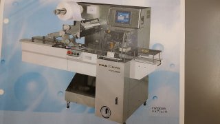 (株)フジキカイ　横ピロ包装機　FW3301/B